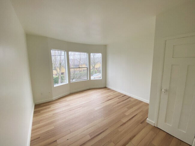 Second bedroom with big bay windows - 2608 E Madison St