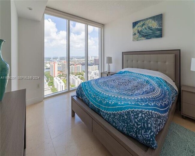 Building Photo - 16699 Collins Ave