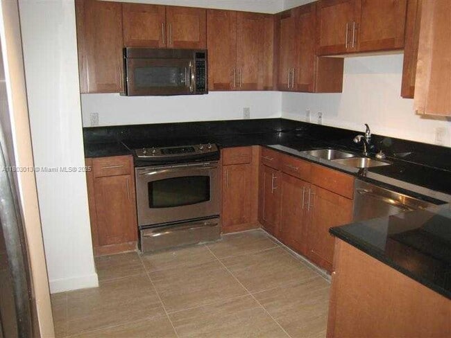 Building Photo - 8390 SW 72nd Ave