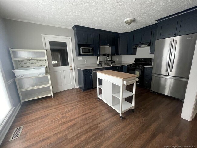 Building Photo - 5701 Paradise Ct