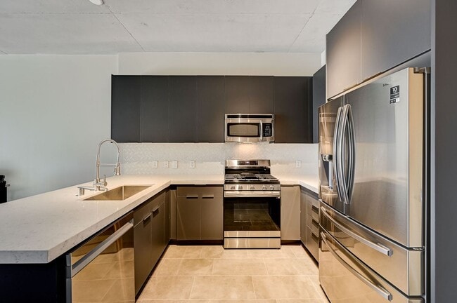 Building Photo - Fully Furnished 4th-Floor Condo with Stunn...