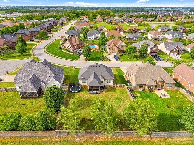 Building Photo - Move-In Special! Spacious 4-Bedroom Home w...