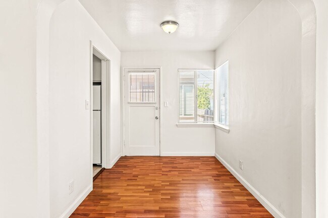 Building Photo - Renovated 1-Bedroom with Gated Parking & Garbage Paid!