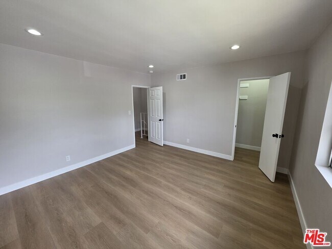 Building Photo - 14747 Woodruff Ave
