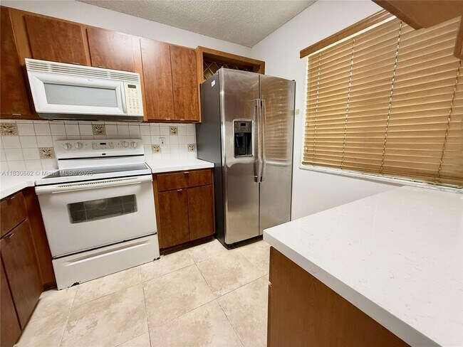 Building Photo - 8550 N Sherman Cir
