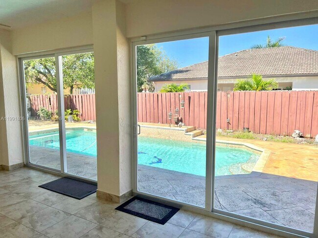 Building Photo - 8899 NW 176th Ln