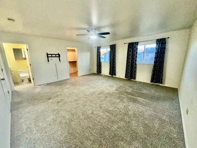 Building Photo - Check out the private fenced backyard!