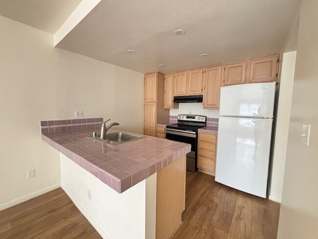 Building Photo - Spacious 1BD/1BA Mission Plaza Condo with Resort-Style Amenities in Prime Mission Valley Location