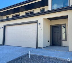 Building Photo - Three Bedroom Two and One Half Bath Duplex...