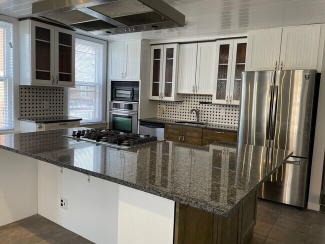 Building Photo - Small pets are welcome with an additional ...