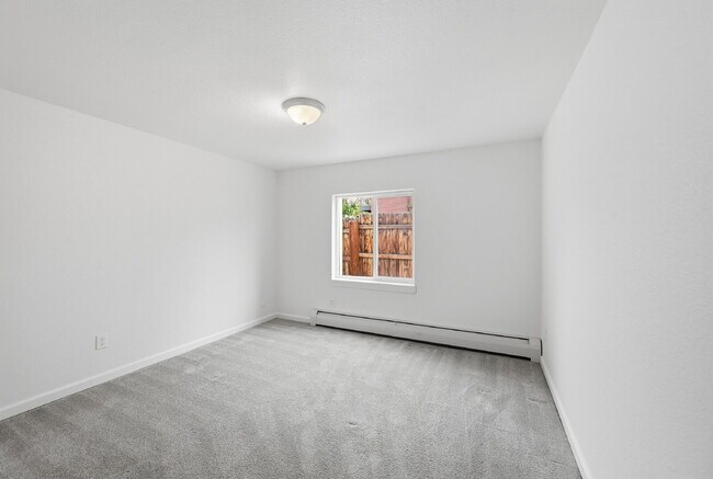 Building Photo - $1,340.95 with $300 Off the first month's rent,  2 Beds - 1 Bath, Condo in Denver with Granite Co...