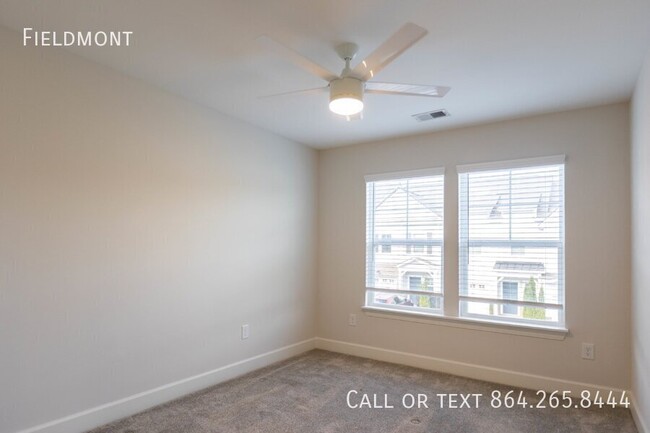 Building Photo - Like-New Townhome with a Fence & Garage!