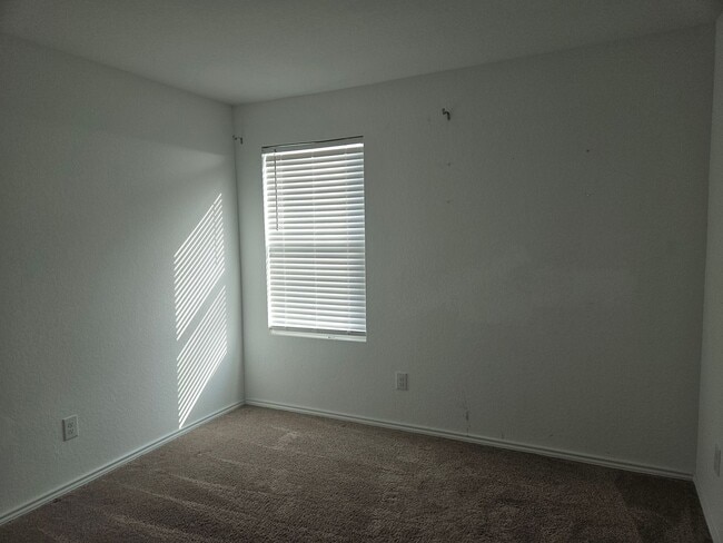 Building Photo - 4 Bedroom with 2 car garage