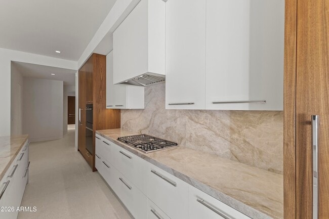 Building Photo - 6587 N Palmeraie Blvd