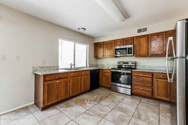 Building Photo - 12022 S Mandan St