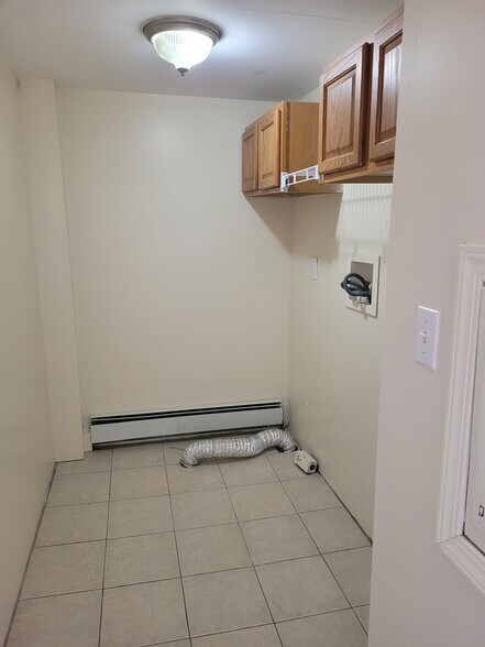 Utility room w/ laundry hook up - 6963 NY-38