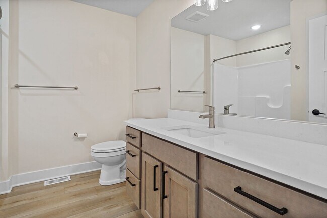 Building Photo - 3 Bed / 2.5 Bath Townhome w/Deck, Walkout Finished Basement, 9' Ceilings, Quartz Tops, Stainless ...