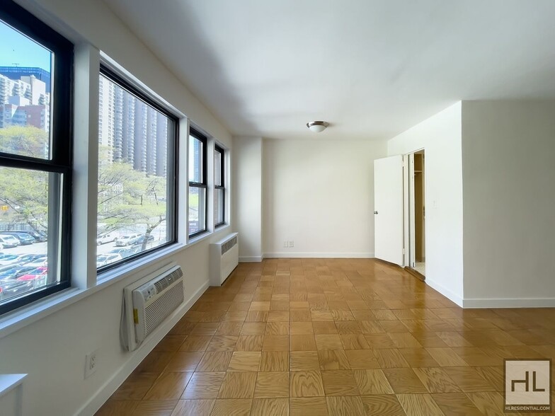 Building Photo - E 36th St | Alcove Studio | In-building laundry