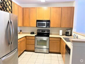 Building Photo - Furnished! Cozy one bedroom with large bed...