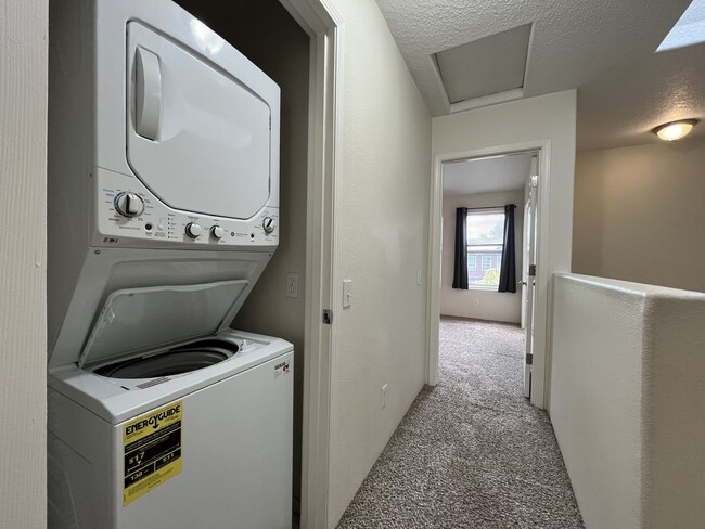 Building Photo - Spacious Three-Story Townhome Near Orenco Station with Attached Garage, Private Balcony, and Vaul...