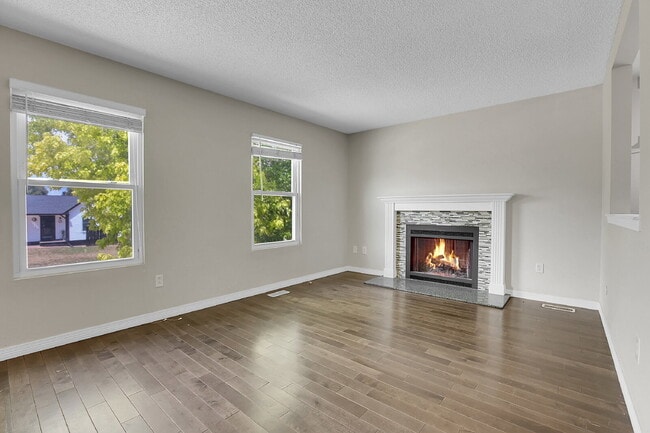 Building Photo - $2,720.95 - 4 bed, 2 bath, located in Aurora with attached Garage and In Unit Washer and Dryer!