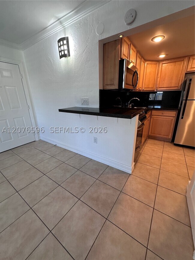 Building Photo - 8615 SW 68th Ct