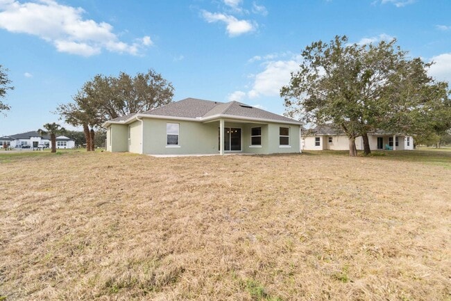 Building Photo - MOVE IN SPECIAL- Beautiful 4/2 Home on 3/4 Acre For Rent in St. Cloud