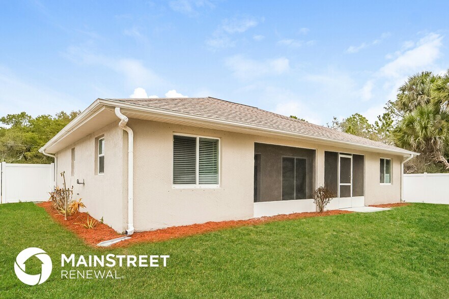 Building Photo - 5697 Babroff Terrace