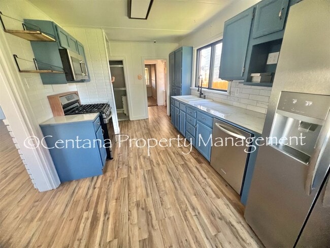 Building Photo - Remodeled 2 bedroom house on the flats with a garage, fenced yard, storage, and so much more!