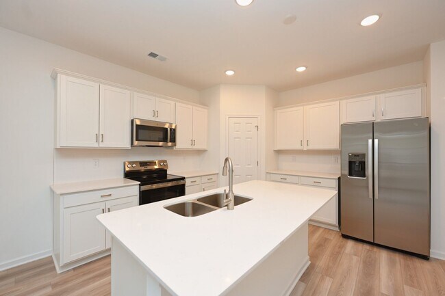 Building Photo - **BE THE FIRST PERSON TO LIVE IN THIS BRAND NEW BRICK TOWNHOME IN THE VILLAS AT REGAL SQUARE FEAT...