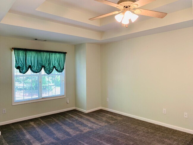 Building Photo - Great location! Lawncare/water is included...