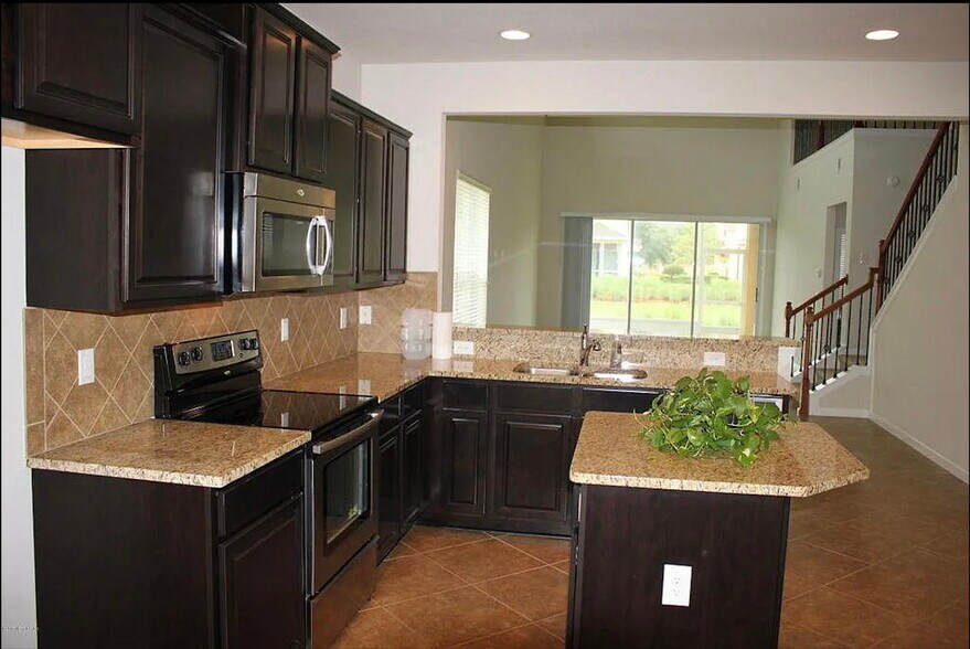 Building Photo - 14159 Mahogany Ave