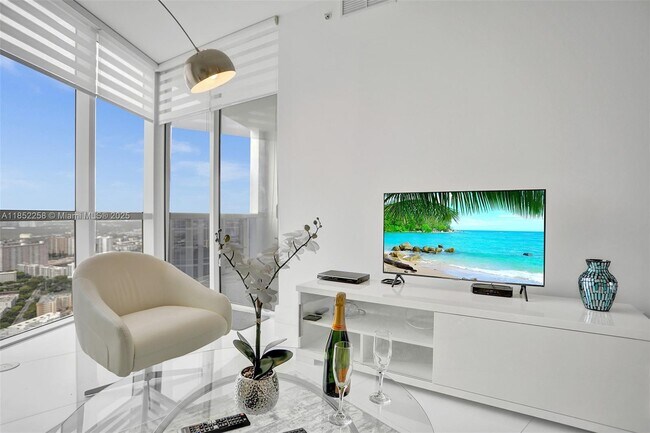 Building Photo - 18201 Collins Ave