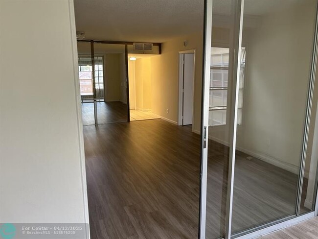 Building Photo - 6000 NW 64th Ave