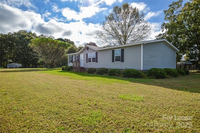 Building Photo - 711 W C J Thomas Rd