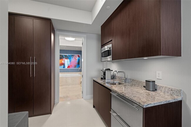 Building Photo - 9703 Collins Ave