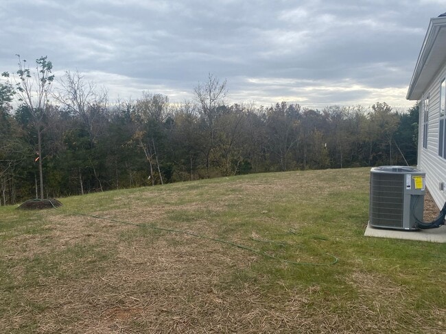 Building Photo - Brand New Construction - 4 bedroom 2 full ...