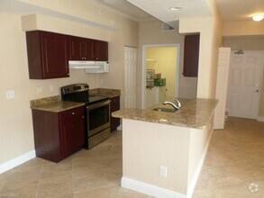 Building Photo - ANNUAL RENTAL - 2 BED / 2 BATH CONDO AT ST...