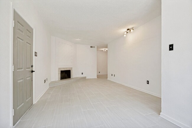 Building Photo - Spacious Dallas Condo with Unbeatable Storage, Private Patio & Carport