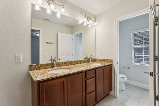 Building Photo - Gorgeous 3/3 Townhouse in VillageWalk of Lake Nona (Gated)