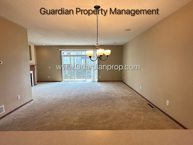 Building Photo - Pet Free Champlin Town Home, 3.5 Baths, 2 Car Garage, Dishwasher, Balcony, Available end of April