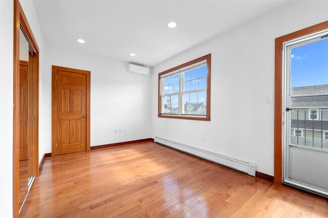 Building Photo - 38-42-42 216th St