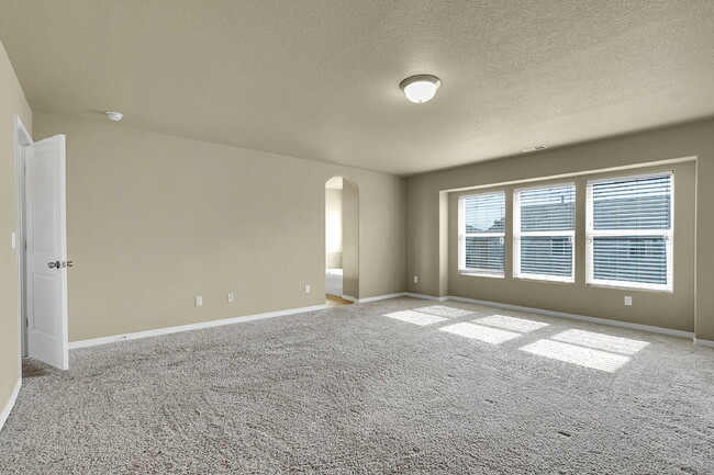 Building Photo - $2,540.95 - 4 Bed, 2.5 Bath Home in CO Springs with Fenced in Yard and 3 Car Garage!