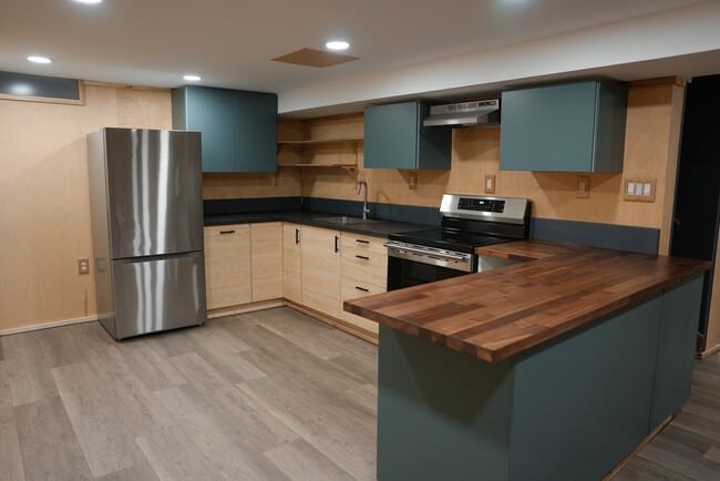 Kitchen with all new appliances - 2507 3rd St NE