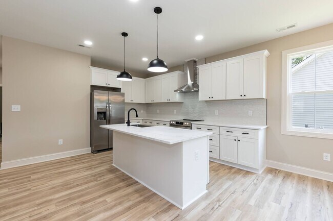 Building Photo - Comfort and Space with Easy Access to the ...