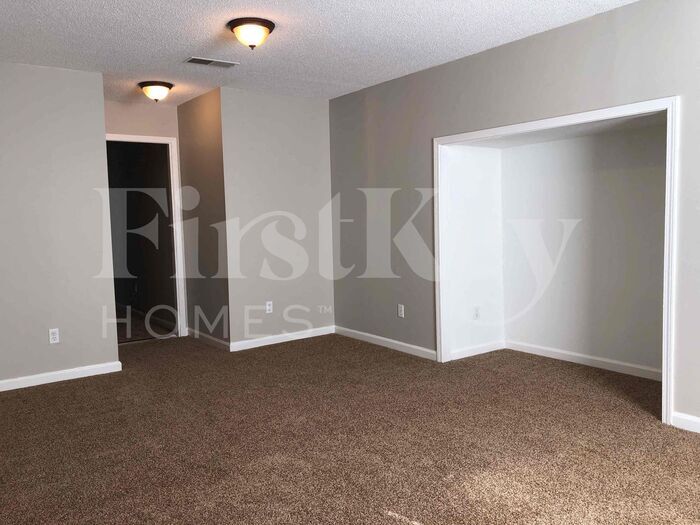 Building Photo - 7678 Breeze Wood Cove