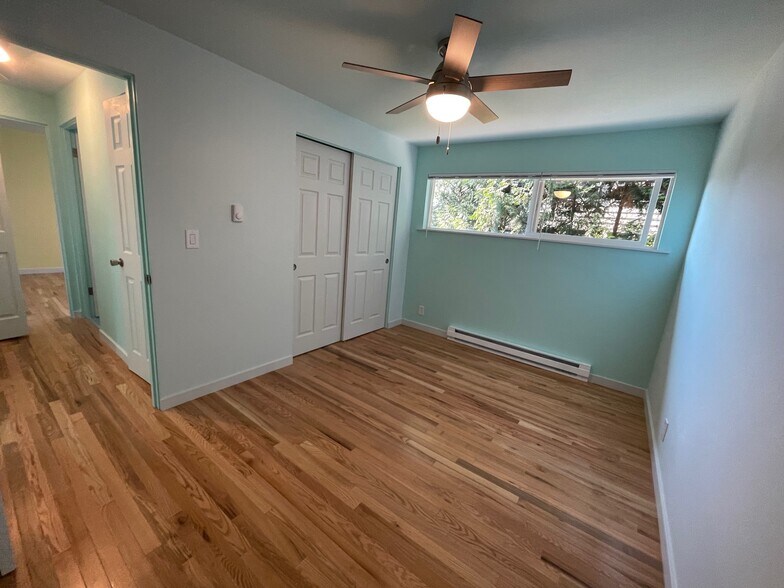Spacious bedroom (picture is from similar apartment one floor up. Colors may vary) - 2801 14th Ave W