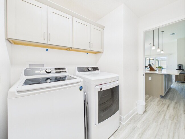 Building Photo - Furnished 3/2 in Water’s Edge | Golf Cart ...