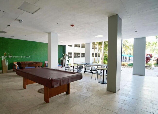 Building Photo - 19370 Collins Ave