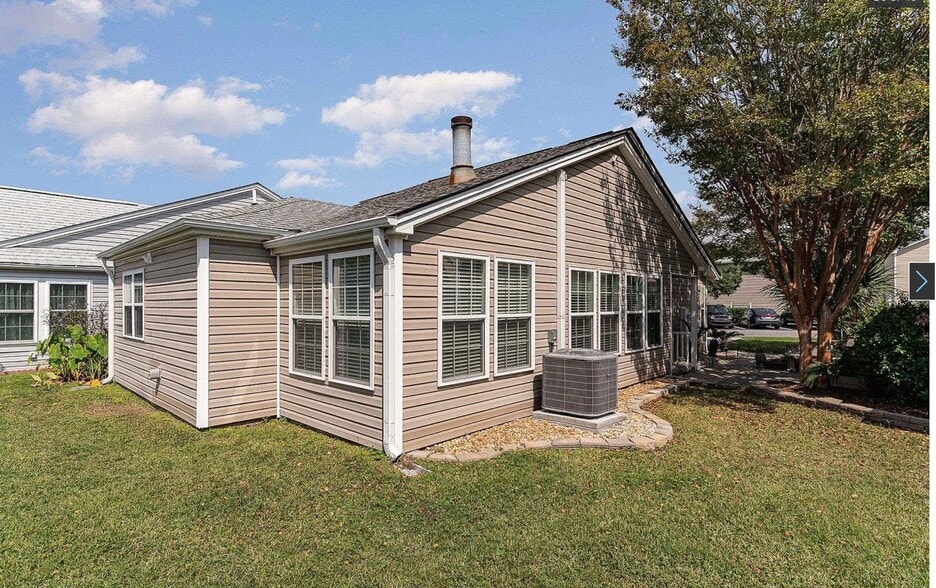 Outside side of home - 203 Lyons Cove Dr
